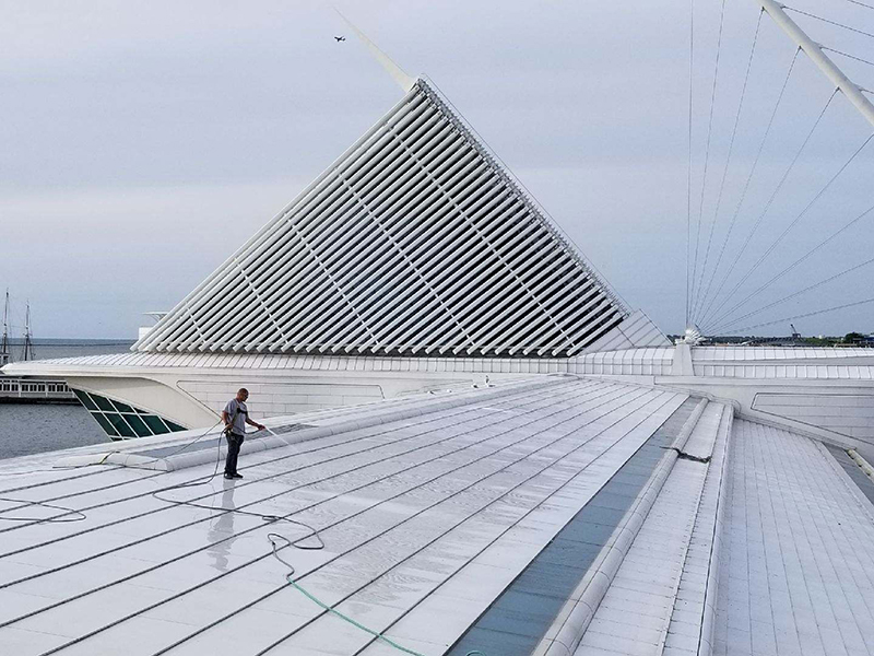Cleaning the roof of the Milwaukee Art Museum, an example of structure cleaning